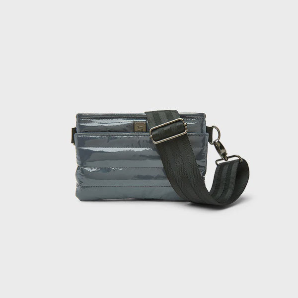 BUM BAG CROSSBODY in Carbon Patent
