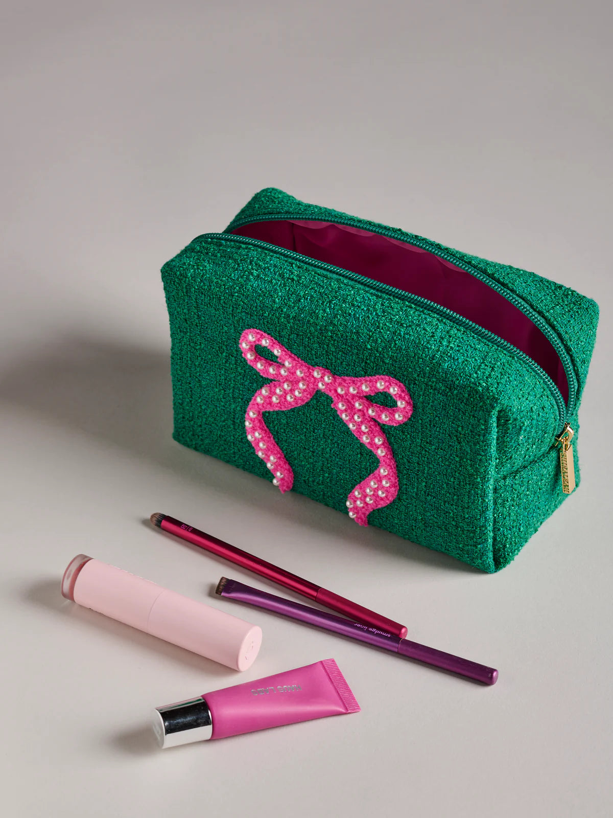SMALL MARA BOW ZIP POUCH in Green